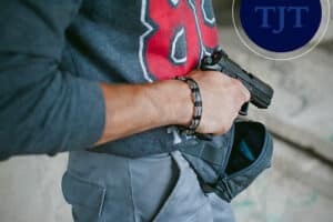 Man carrying a concealed handgun, illustrating NJ private-property carry rules after the Vampire Rule ruling