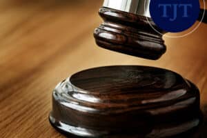 Judge's gavel on a wooden bench, representing a New Jersey gun charge being dismissed in court