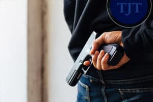 Person concealing a handgun in their waistband in New Jersey